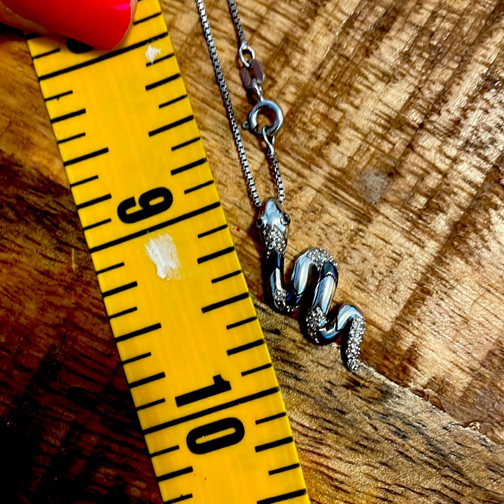 Silver and black snake necklace